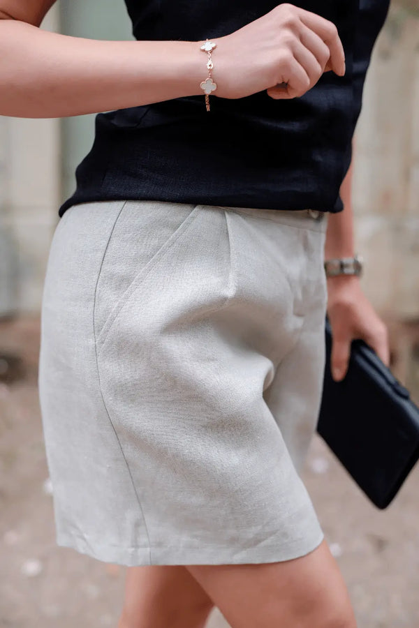 Close-up of relaxed linen shorts in oatmeal